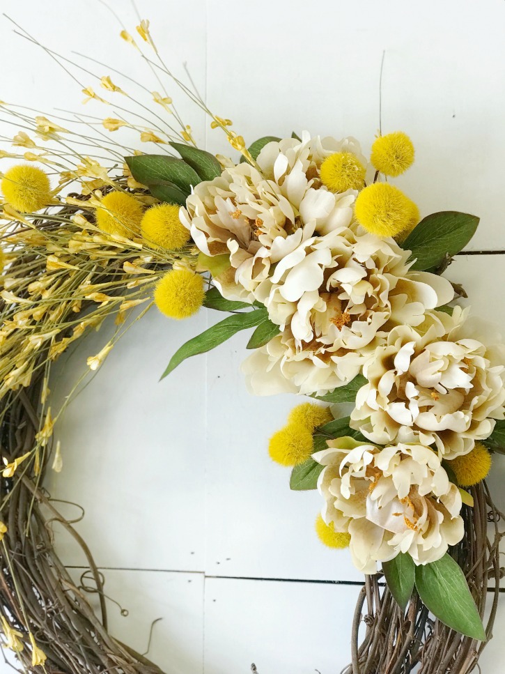 fall wreath with yellow and white floral